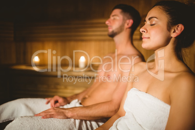 Happy couple enjoying the sauna together