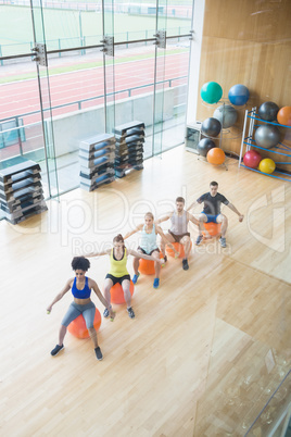 Fitness class exercising in the studio