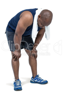 Fit man taking a break from working out