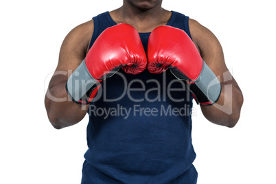 Fit man boxing with gloves