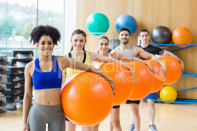 Fitness class exercising in the studio