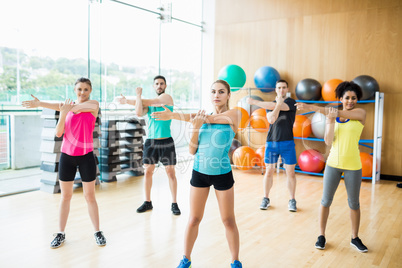 Fitness class exercising in the studio