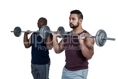 Man lifting barbell with trainer