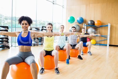 Fitness class exercising in the studio