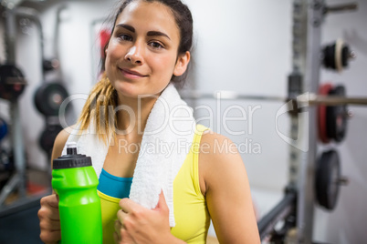 Smiling woman taking a break from workouts