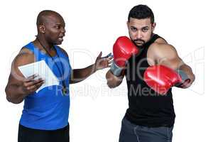 Boxing coach with his fighter