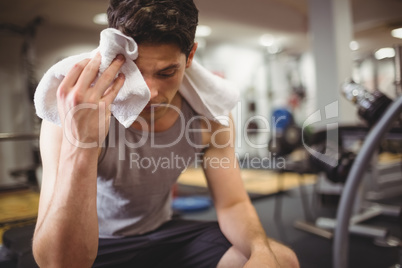 Fit man taking a break from working out