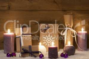 Purple Christmas Gifts With Candles And Balls, Snow