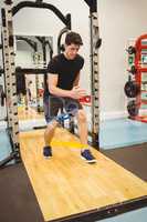 Fit man using resistance band