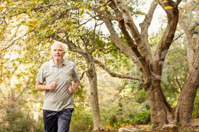 Senior man working out in park