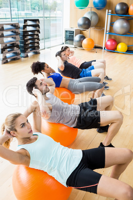 Fitness class exercising in the studio