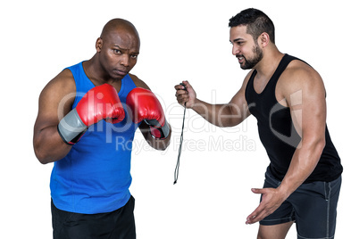 Strong friends using kettlebells together