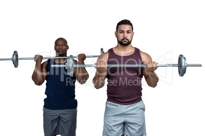 Man lifting barbell with trainer