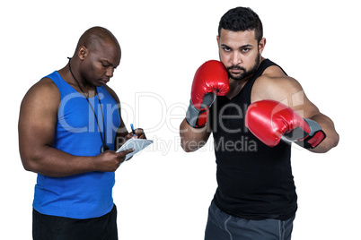 Boxing coach with his fighter