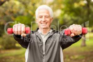 Senior man working out in park