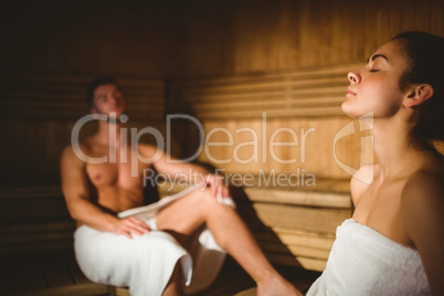 Happy couple enjoying the sauna together