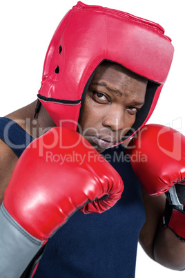 Fit man boxing with gloves