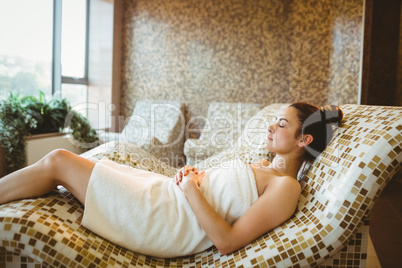 Woman relaxing while lying down