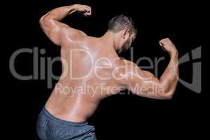 Bodybuilder man flexing his muscles