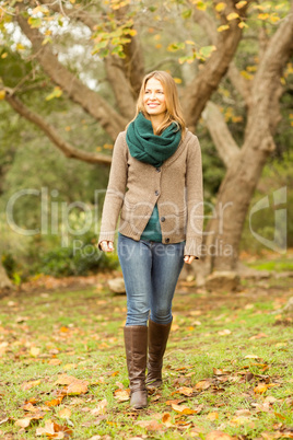 Smiling woman walking to the camera