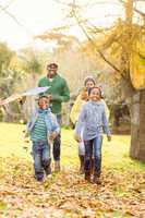 Young family playing with a kite