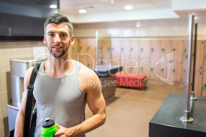 Smiling man about to go to the gym