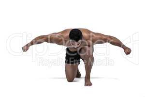 Muscular man flexing for camera