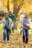 Smiling young family playing together