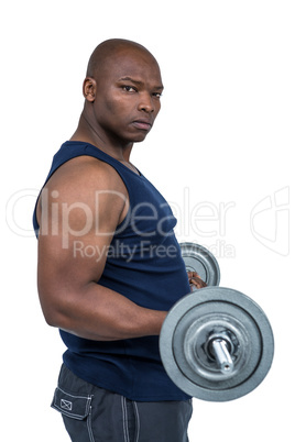 Fit man lifting heavy barbell