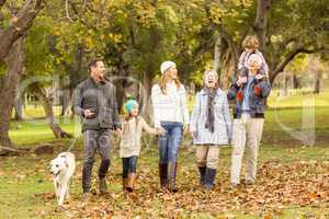 Extended family posing with warm clothes