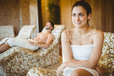 Smiling woman sitting on a chair