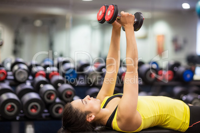 Woman working out with weights