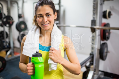 Smiling woman taking a break from workouts