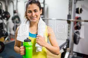 Smiling woman taking a break from workouts