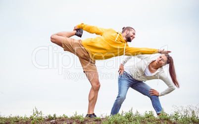 Couple stretching on a hike