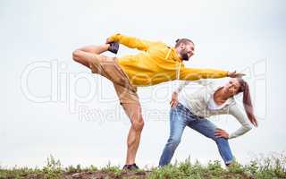 Couple stretching on a hike