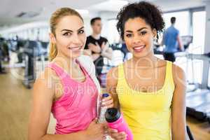 Fit women smiling at the camera