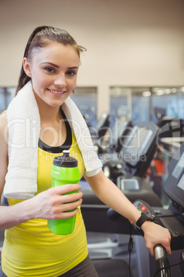 Fit woman using the treadmill