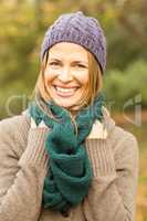 Smiling pretty woman holding her scarf