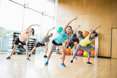 Fitness class exercising in the studio