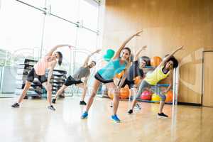 Fitness class exercising in the studio
