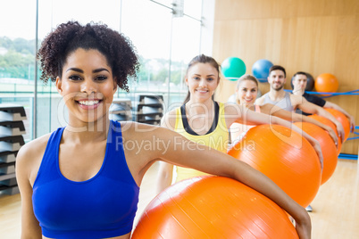 Fitness class exercising in the studio