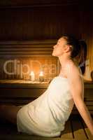 Pretty woman relaxing in the sauna