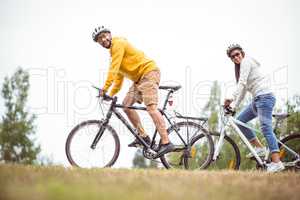 Happy couple on a bike ride