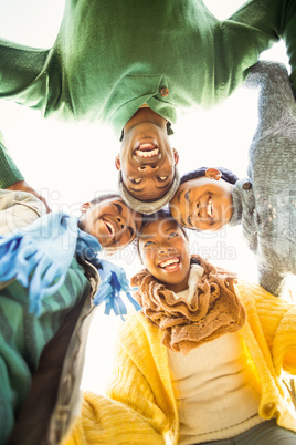 Young family doing a head circles