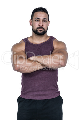 Muscular man looking at camera