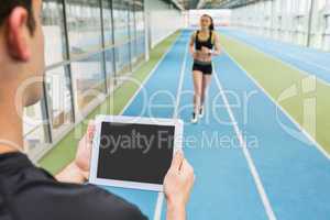 Fit couple on the indoor track