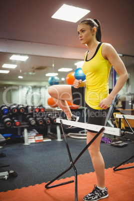 Fit woman measuring her jump