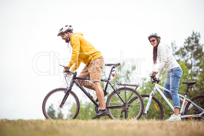 Happy couple on a bike ride