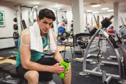 Fit man taking a break from working out